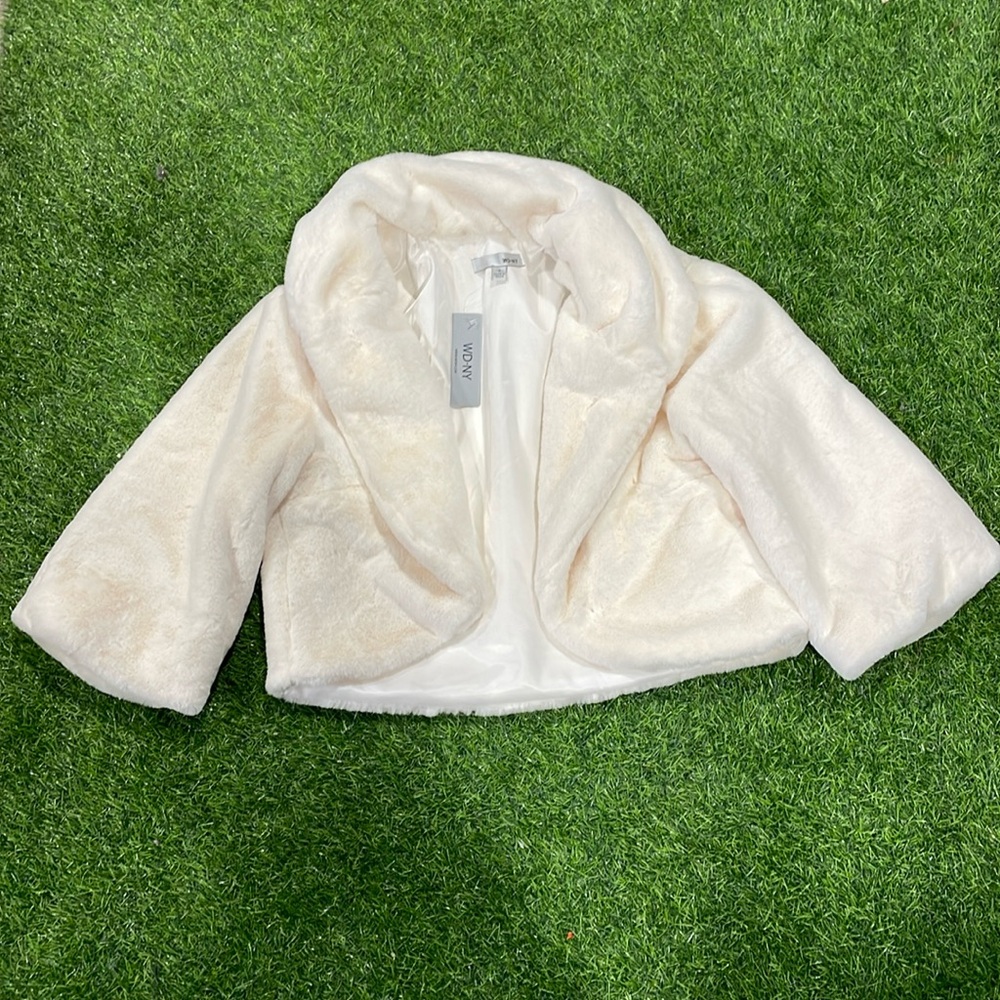 Ladies cream short fleece open front jacket with shawl collar.